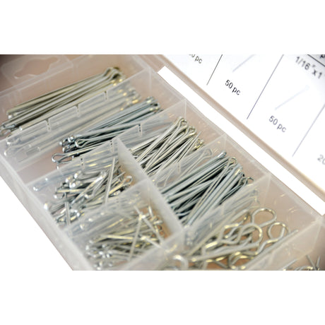 The Cotter Pins & Grip Clips Kit, 260 pcs. Compak (Sparex Part No.S.29884) from Sparex is a plastic organizer box containing various sizes of cotter pins neatly arranged in separate compartments. A label on the lid indicates the quantity and size of each type of cotter pin, making this kit an essential addition to any toolbox.