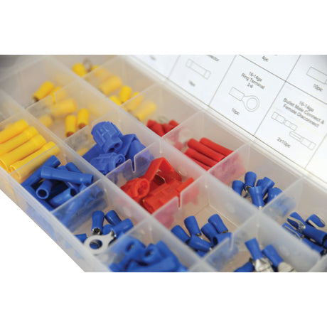 The Sparex Pre Insulated Terminal Various (160 pcs.) - S.29892 is a plastic organizer box that contains an assortment of insulated electrical wire connectors in blue, red, and yellow compartments, featuring different types and sizes. It's perfect for various wiring tasks, with wiring instructions partially visible.