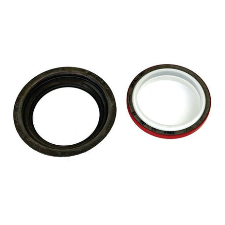 Two circular rubber seals are placed side by side against a white background. One seal is black, and the other is white with a red border, resembling the precision of the Oil Seal - Front (Sparex Part No.S.30050) often used in International Harvester machinery from Sparex.