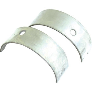 Two metallic Conrod Bearing Pairs from Sparex, each with a central hole, are positioned parallel to each other (Sparex Part No. S.31700).