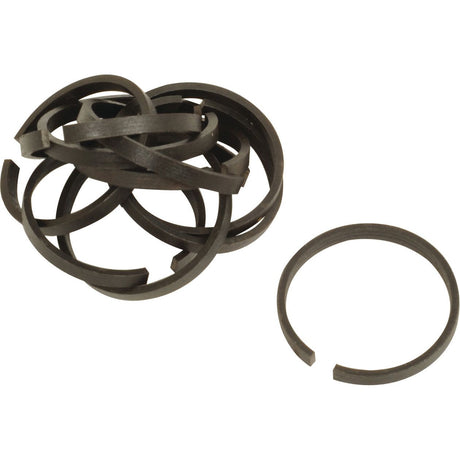 Displayed is a set of black hydraulic piston rings, identified as Sparex Part No. S.3353, specifically designed for use in hydraulic cylinders, with one ring separated from the group.