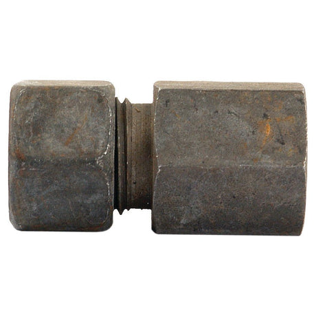 Close-up of a Sparex Hydraulic Metal Pipe Female Stud Coupling G.A.V. 12L - M16 x 1.5 (Part No. S.34143) with threaded interior, showcasing a weathered surface and hexagonal shape on both ends.