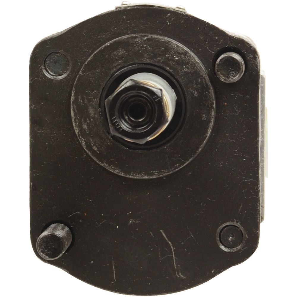 A close-up of the Tandem Hydraulic Pump, Sparex Part No.S.34410, reveals a cylindrical metal central component encased within a black rectangular base featuring four corner bolt holes, reminiscent of the robust design seen in Case IH / International Harvester equipment.