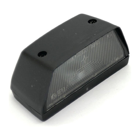 The Sparex Halogen Number Plate Light 12V - S.35540 is a rectangular-shaped black light fixture with a transparent front cover, equipped with screw holes for mounting. It is suitable as a number plate light and can house a halogen bulb.