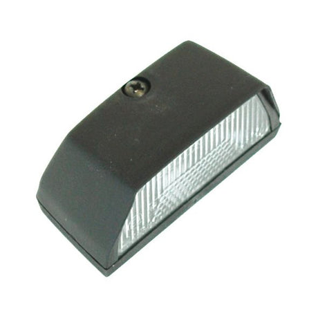 The Halogen Number Plate Light 12V - S.35541 by Sparex is a black rectangular outdoor wall light with a ridged translucent cover, perfect for illuminating number plates. It features a single screw on top and operates at 12V.