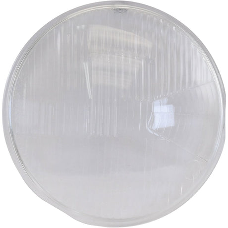 A round, clear glass object with embossed horizontal and vertical lines on its surface, resembling the Sparex Replacement Lens (Fits: - S.35585).