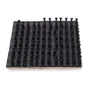 A Massey Ferguson mat by AGCO featuring multiple rows of evenly spaced small, black, rounded pegs.