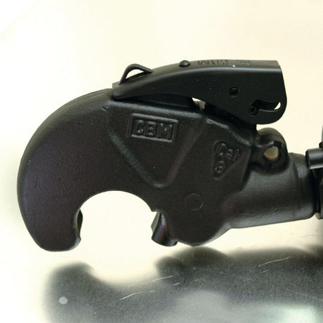 Close-up of a black industrial metal attachment featuring a latch mechanism and embossed with various markings, including "CBM". This end of the Hydraulic Top Link (Cat.28mm/3) Knuckle and Q.R CBM Hook by Sparex showcases rugged durability, ideal for heavy-duty applications. The implement has a cylinder bore of 80mm and a minimum length of 695mm (Sparex Part No. S.399713).