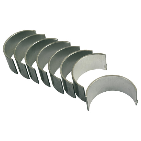 A set of seven Sparex Conrod Bearings +0.020" (0.50mm), compatible with Landini 6000 and Massey Ferguson, arranged in a slight curve.