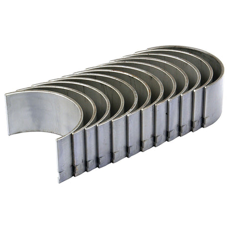 A stack of Sparex Conrod Bearing +0.010'' (0.25mm) Set, arranged in an overlapping pattern, viewed from an angle.