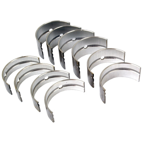 A set of ten curved metal engine bearings arranged in two rows on a white background, compatible with Massey Ferguson tractors. This is the Sparex Main Bearing +0.020'' (0.50mm) set, identified by Sparex Part No.S.40337.