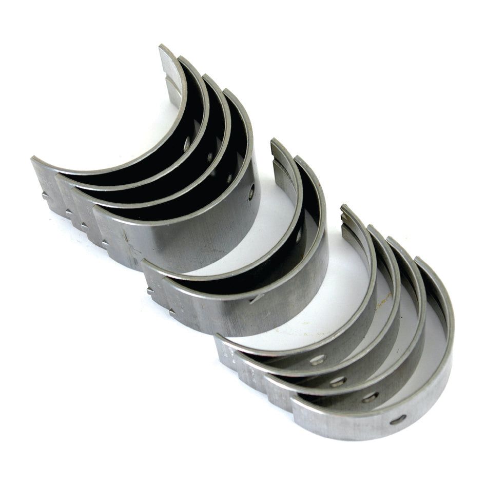 A set of eight Sparex metallic engine bearings compatible with Massey Ferguson 165 (Main Bearing +0.030'' (0.75mm) | Sparex Part No.S.40338) is arranged in two neat rows on a white background.