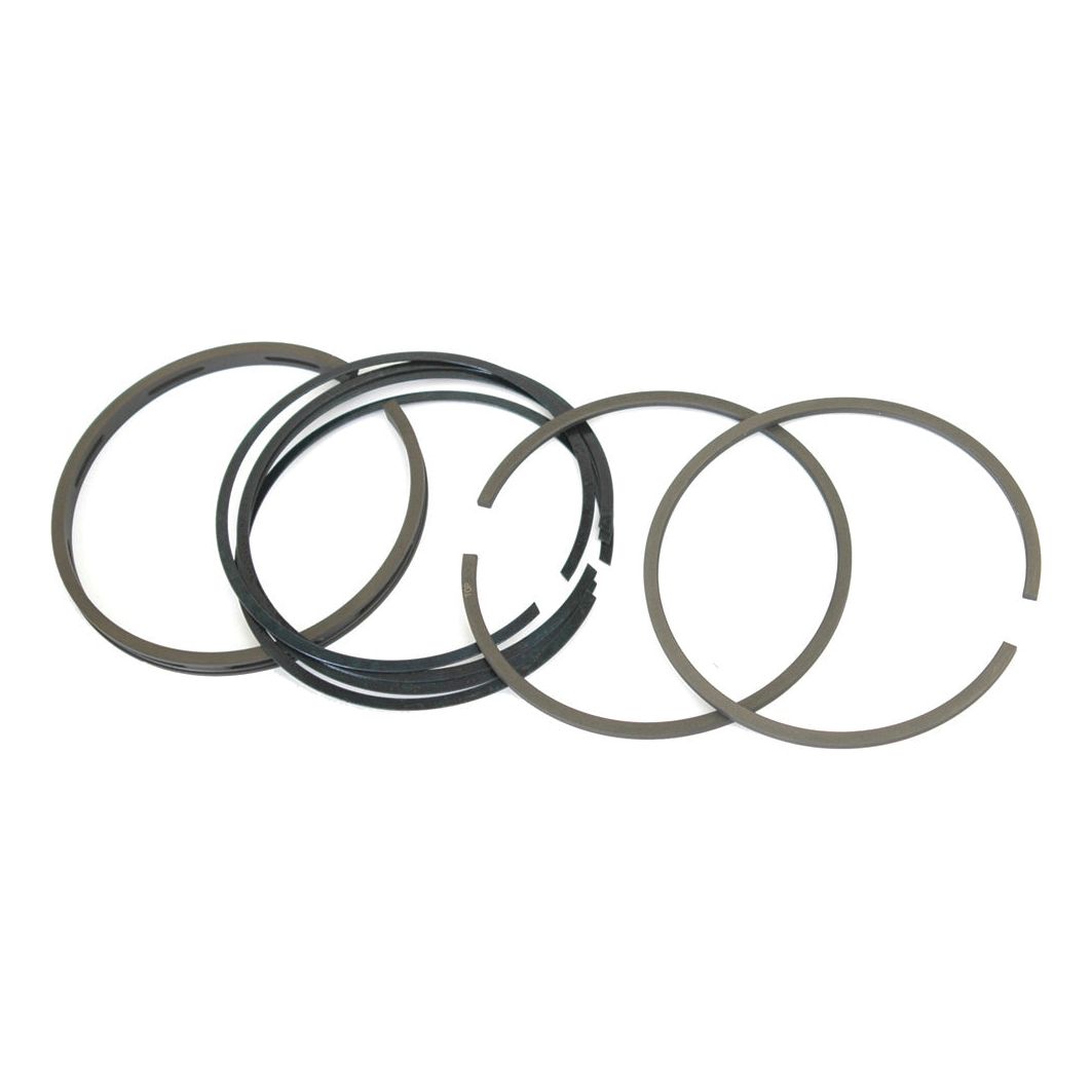 A set of five metal piston rings, from the Sparex Piston Ring and Liner Kit (Part No. S.40429), perfect for Massey Ferguson or Perkins engines, displayed on a white background.