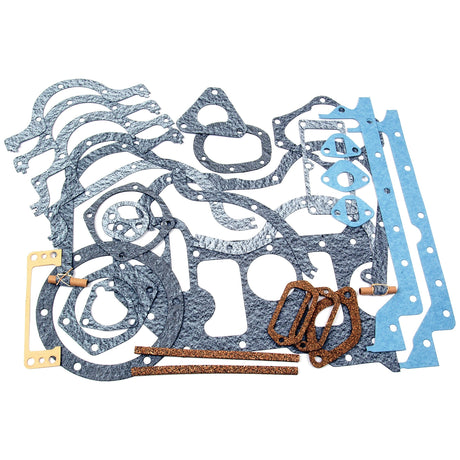 A collection of various engine gaskets laid out on a white background. The assortment includes different shapes and sizes, used for sealing different components in a Perkins or Massey Ferguson engine assembly, specifically the Bottom Gasket Set - 3 Cyl. by Sparex (Sparex Part No.S.40604).