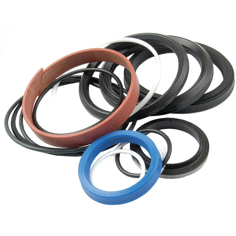 A variety of circular mechanical seals in different sizes and colors, including black, blue, red, and white, are arranged in a pile. Perfect for Massey Ferguson repairs or as Sparex alternatives. Specifically available as the Seal Kit (Boom Ram) under Sparex Part No. S.41281 by Sparex.