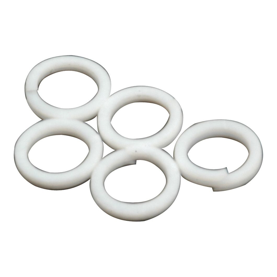 Five Sparex Hydraulic Lift Back Up Rings (Part No. S.41314), white and circular, arranged in a scattered formation on a plain background, reminiscent of washers.