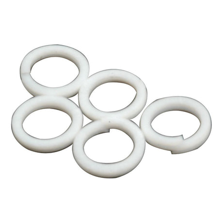 Five Sparex Hydraulic Lift Back Up Rings (Part No. S.41314), white and circular, arranged in a scattered formation on a plain background, reminiscent of washers.