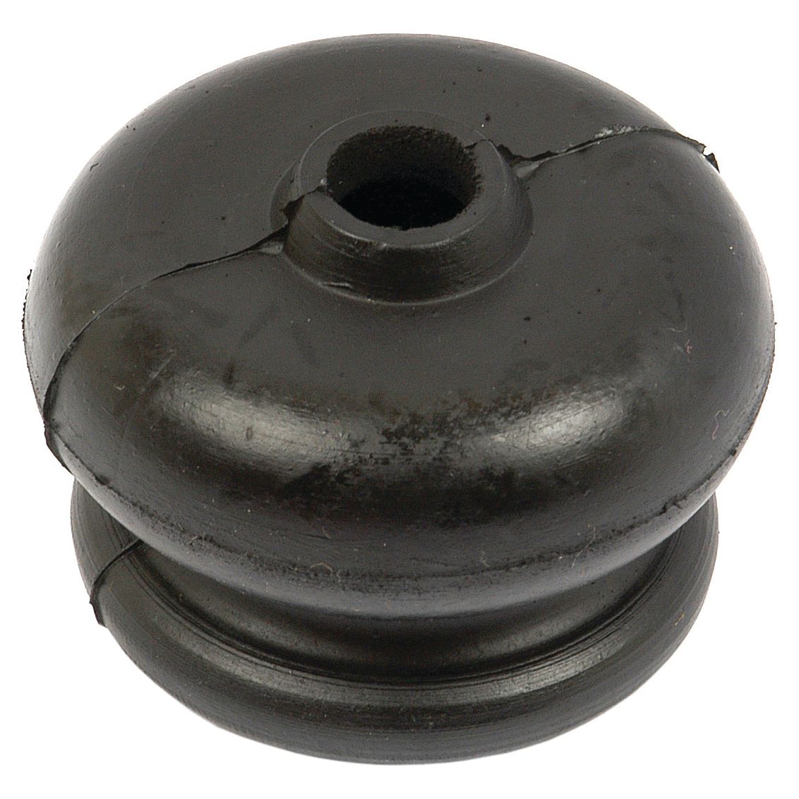 A Brake Rod Boot (Sparex Part No. S.42235), branded by Sparex, is a black cylindrical rubber grommet with a center hole and visible surface cracks, commonly used in Landini tractors.