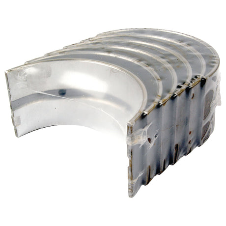 A set of four transparent plastic clamshell packaging pieces aligned in a stack, each with curved edges, ideal for storing the Main Bearing +0.010'' (0.25mm) (Set), Sparex Part No.S.42368 by Sparex.