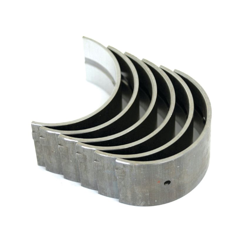 A set of six curved metallic bearing shells, ideal for Landini and Massey Ferguson tractors, arranged in a row. 

Rewritten:
The Sparex Main Bearing Set +0.030'' (0.75mm), model number S.42370, comprises six curved metallic bearing shells perfect for Landini and Massey Ferguson tractors.