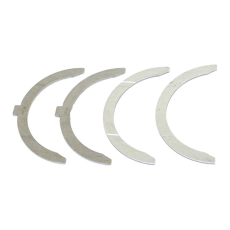 Four semi-circular metal washers from the Thrust Bearings Set (Sparex Part No. S.42427) by Sparex, arranged in a line against a white background, for a Massey Ferguson 23C 4 Cyl Diesel Engine.
