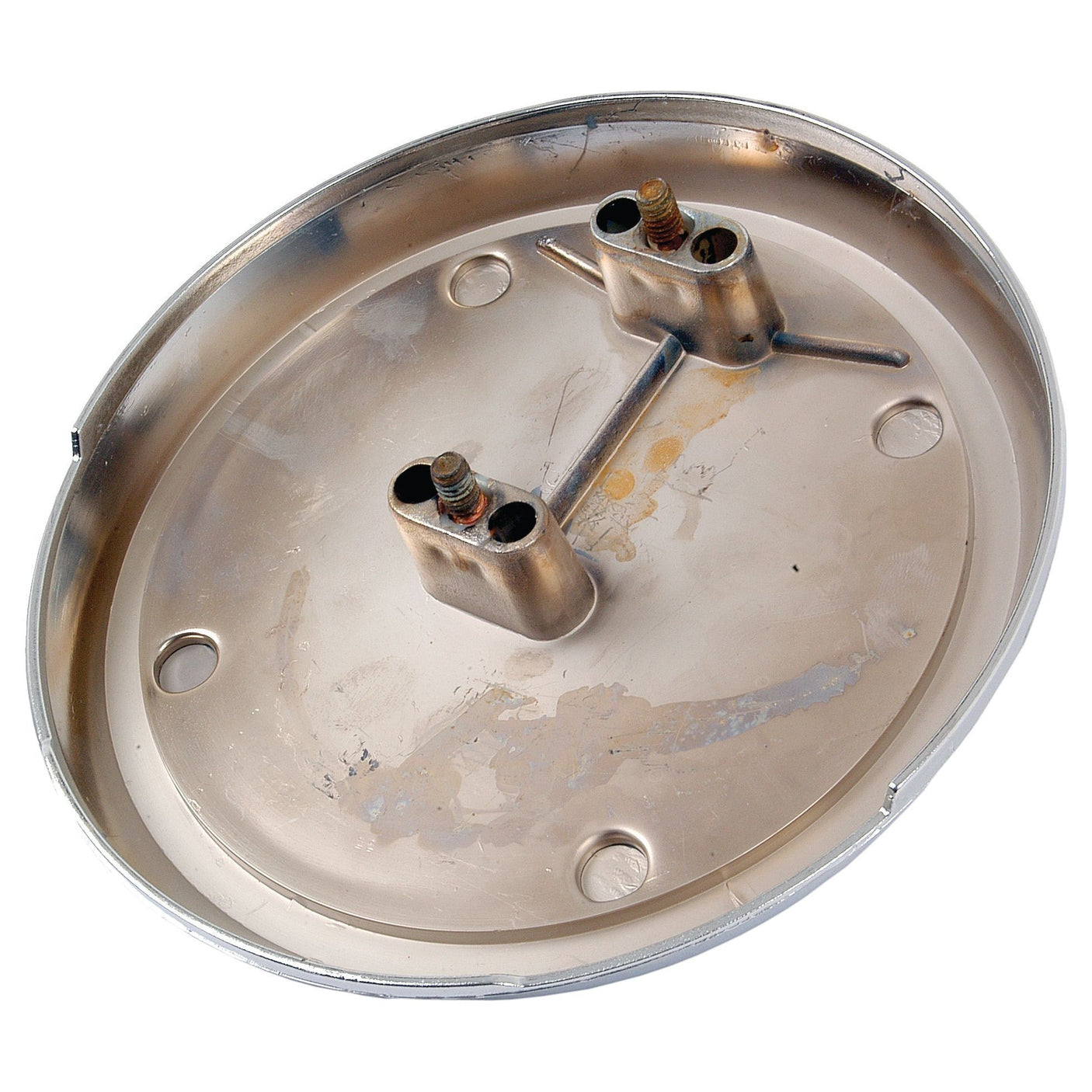 Close-up view of a Medallion (Sparex Part No. S.42550) with a metallic oval base, featuring two protruding metal components and several circular indentations, designed for use in the Massey Ferguson 175.