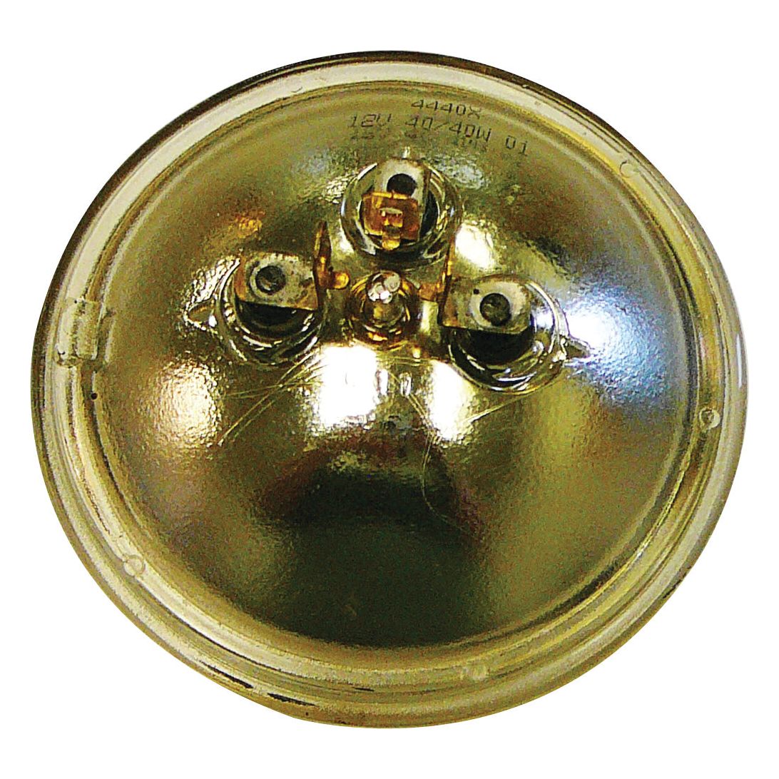 Close-up of a round, reflective Halogen Head Light RH & LH (Straight) with three prongs on its backside. The surface is slightly scratched and tarnished with some text imprinted near the top, distinguishing it as a Sparex S.4277 sealed beam.