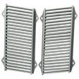 Two grey metal grill grates with parallel bars are placed side by side. Each grate, which is part of the durable Front Grille set (Sparex Part No.S.42914), has mounting holes at the four corners, making it suitable for Massey Ferguson and Landini tractors. This product is from the Sparex brand.