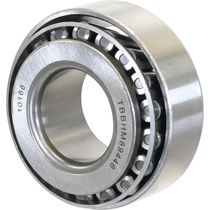 Close-up of a metal cylindrical roller bearing with engraved specifications, featuring rollers and separators inside an outer ring. This high-quality Sparex Taper Roller Bearing (HM89446/HM89410) - S.42945 ensures reliable performance for various applications.