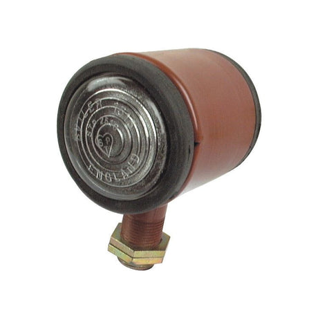 Close-up view of the Sparex Side Light - Front/Rear (Halogen), RH & LH, 12V (Sparex Part No. S.43041) showing its cylindrical design with a metallic circular end mounted on a threaded bolt with a nut. The body is predominantly brown and features a rubber ring around the metallic part, typically used in side light assemblies.