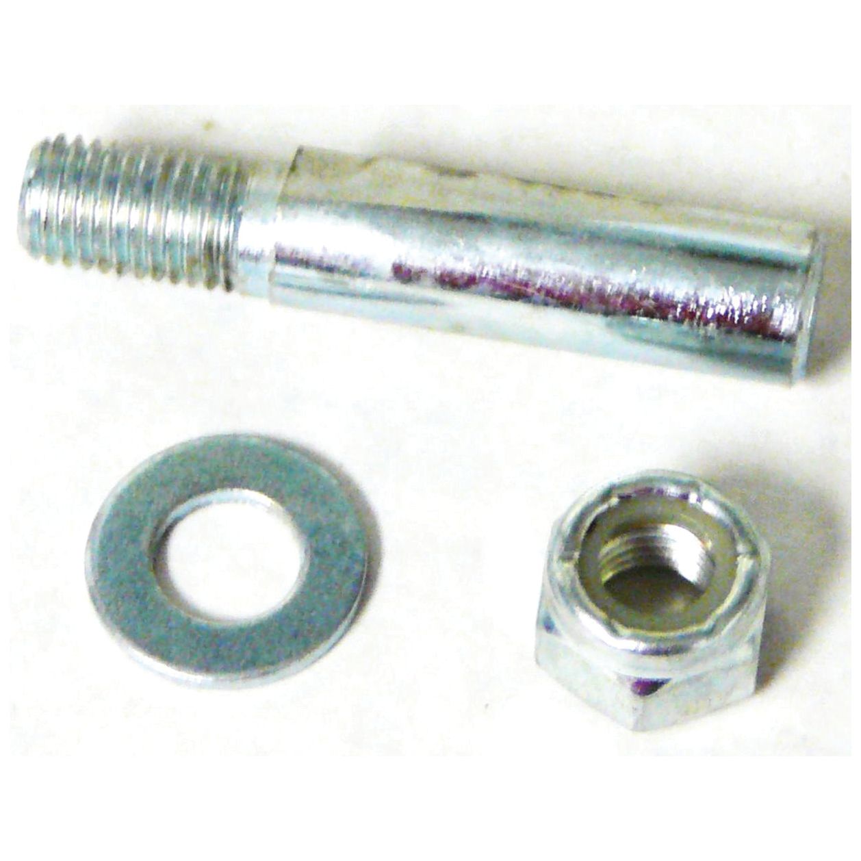 A cotter pin, a nut, and a washer from the Sparex Cotter Pin, Nut and Washer set (Sparex Part No. S.43068) are placed on a white surface, resembling components of a Massey Ferguson Water Pump Hub.