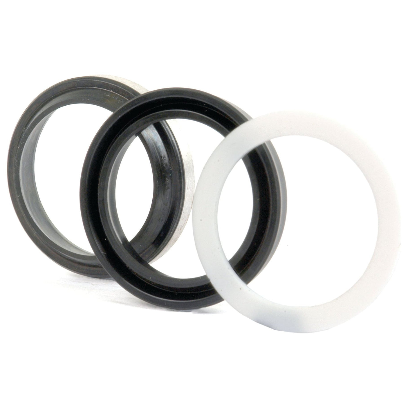 Three circular mechanical seals, two black and one white, are displayed in a row, ideal for Massey Ferguson hydraulic lift cylinders. They are part of the Sparex Seal Kit (Hydraulic Lift Cylinder) with Sparex Part No.S.43106.