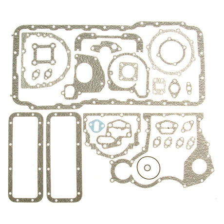 A set of various engine gaskets from the Sparex Bottom Gasket Set - 6 Cyl. (AT6-354-4) | Sparex Part No. S.43181, arranged flat on a white background. The gaskets come in different shapes and sizes to fit various engine components.