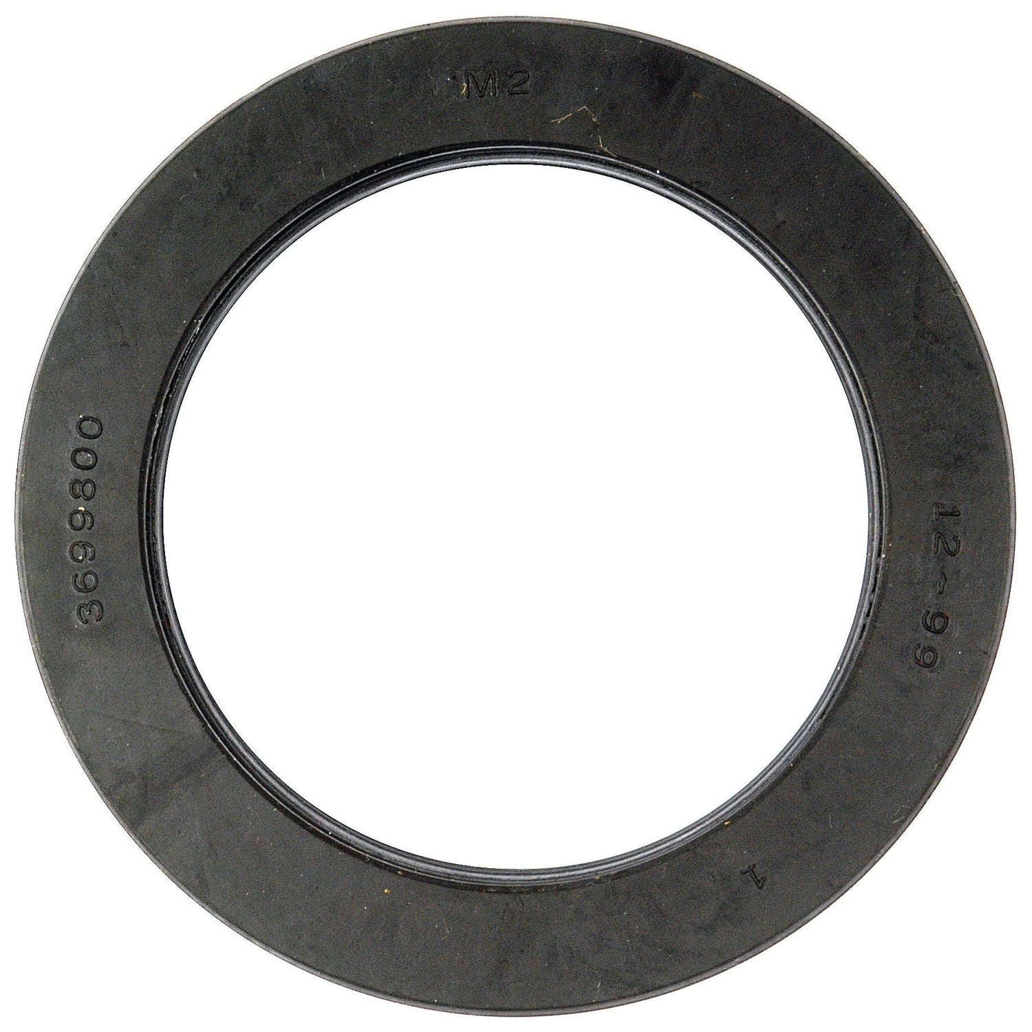 A black, circular rubber gasket with numerical markings "3698800," "12-99," and "M2" imprinted on its surface, commonly used as the outer halfshaft seal in Landini and Massey Ferguson machinery. This product is known as the Oil Seal (73 x 102 x 16.5mm) under Sparex Part No.S.43591 by the brand Sparex.