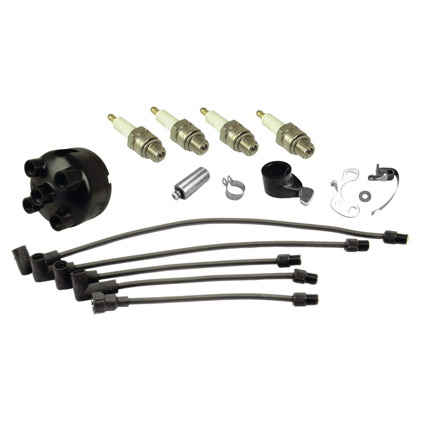 The Sparex Ignition Kit (Part No. S.43666) is laid out, featuring four spark plugs, ignition wires, a distributor cap, rotor, and various small components—ideal for vintage models like the Massey Ferguson TE20.