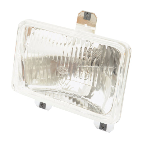 The Sparex Head Light (Halogen) RH & LH, LH Dip, 12V - S.43906 is a rectangular, clear glass headlight with a metal mounting bracket and two screws at the base, featuring an IP65 rating for weather resistance.