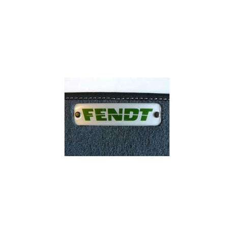 Close-up of the Fendt logo on the Fendt - Floor Mat - Edged Carpet Material (X991450417000) by AGCO, secured by two screws.