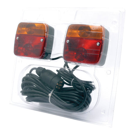 A pair of red and amber Sparex Lighting Set (Halogen) trailer tail lights, featuring a black 7 Pin Plug and providing four functions (Brake, Tail, Indicator, Number Plate), 12V - S.51746, packaged in clear plastic.