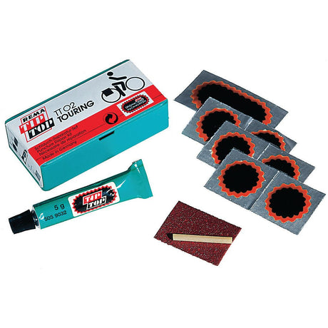 A comprehensive Sparex Puncture Repair Kit (Sparex Part No. S.52211), alternative to 129422, featuring a box, six patches, a tube of adhesive, a piece of sandpaper, and a small stick.