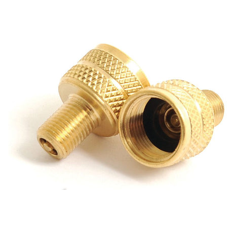 Close-up image of two brass valve adapters, featuring a threaded end and a knurled grip. These Tyre Valve Reducer EM Caps by Sparex (Part No. S.52263) come in a convenient set of 10 pieces for versatile applications.