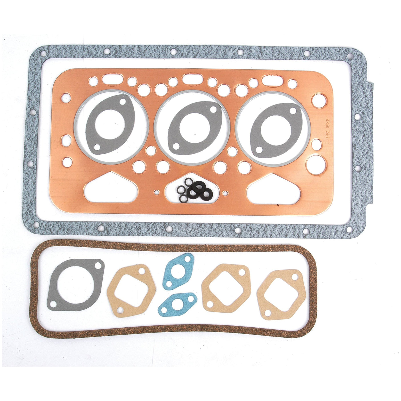 The Sparex Top Gasket Set (Sparex Part No. S.52600) for 3-cylinder engines, including models 10/42, 3/45, 3DL, and 3/142, features a rectangular metal gasket with circular cutouts, various smaller gaskets of different shapes, and several rubber O-rings. Ideal for Leyland engines.