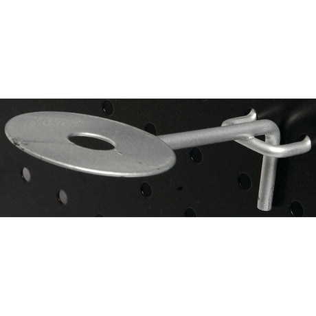 Sparex DISPLAY PLATE-ROUND 50MM OD (Part No. S.53581) with a metal hook and a circular 10mm plate, all attached to a black perforated board.