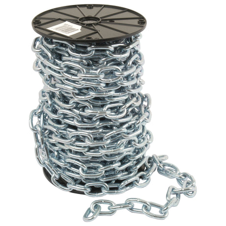 A large spool of heavy-duty Short Link Chain 8 x 47 x 30mm x 19M - S.55528 from Sparex sits upright, with the zinc-plated chain slightly spilling over the side. The spool has a black core.