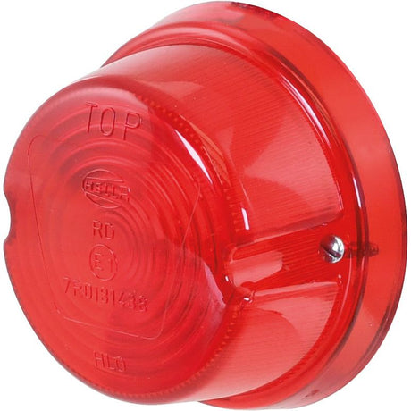 Close-up of a round, red automotive Rear Light (Halogen), model S.56030 from Sparex, with text and numbers marked on it. The light has a clear plastic cover and features a Hella bulb inside. Designed to be mounted on a vehicle, it has visible screws on the side.