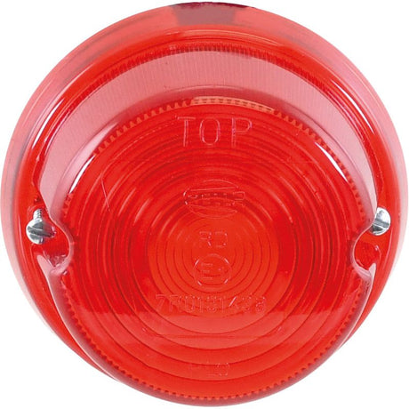 Close-up of the Sparex Rear Light (Halogen), 1, Tail, RH & LH - S.56030 with a red lens for enhanced visibility, featuring a round reflector with "TOP" and "E" imprinted on the surface and secured by two screws.