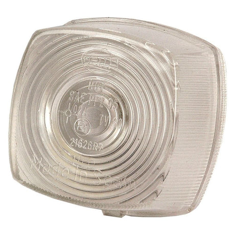 The clear plastic front light cover, featuring circular ridges and embossed with part numbers, is identified as a Sparex Replacement Lens made for S.56024 & S.56258 under Part No. S.56166 in Spain.