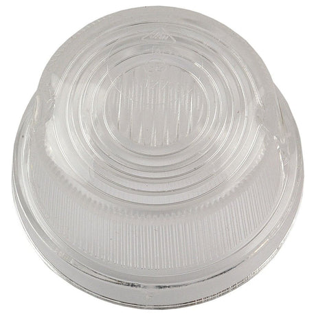 Clear, round polycarbonate replacement lens with ribbed edges and a concentric circle design, Sparex part number S.56175.