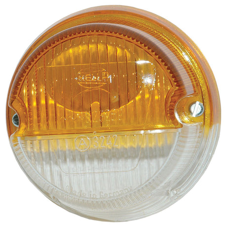 The *SPECIAL PRICE* Replacement Lens by JMCE DEALS for models S.56132 - S.56183 is a round, dual-colored vehicle signal light with an amber top half and a clear bottom half, designed to be mounted with two screws. It features a segmented lens offering UV protection and includes text indicating it is made in Germany.