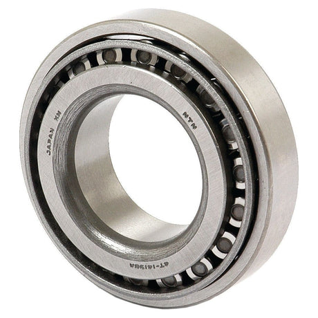 A close-up view of the Sparex Taper Roller Bearing (14138A/14274) - S.57279, showcasing the metal outer ring, cylindrical rollers, and inner ring. The silver-bearing features metric engravings on the inner ring.