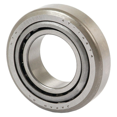 A close-up image of the Sparex Taper Roller Bearing (14138A/14274) - S.57279 highlights its metallic structure, detailed inscriptions, and visible ridges, showcasing the precision craftsmanship by Sparex.